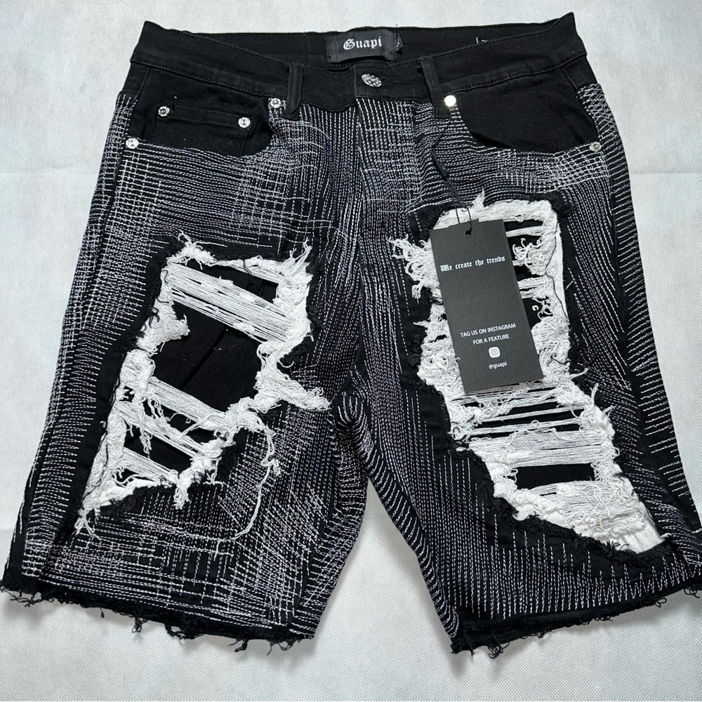 Guapi distressed and stitched cut off shorts NWT size 32